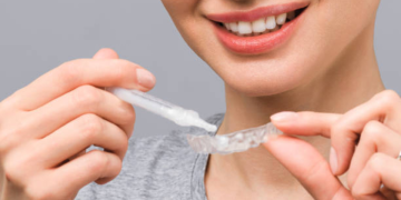 The Importance of Regular Dental Check-Ups and Overcoming Dental Fear: Benefits of Dental Implants, Crowns, and Teeth Whitening